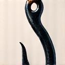 Icon representing quality craftsmanship, perhaps a stylized hammer and fish hook