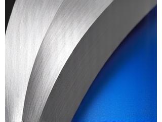 Close-up of polished aluminum sculpture surface